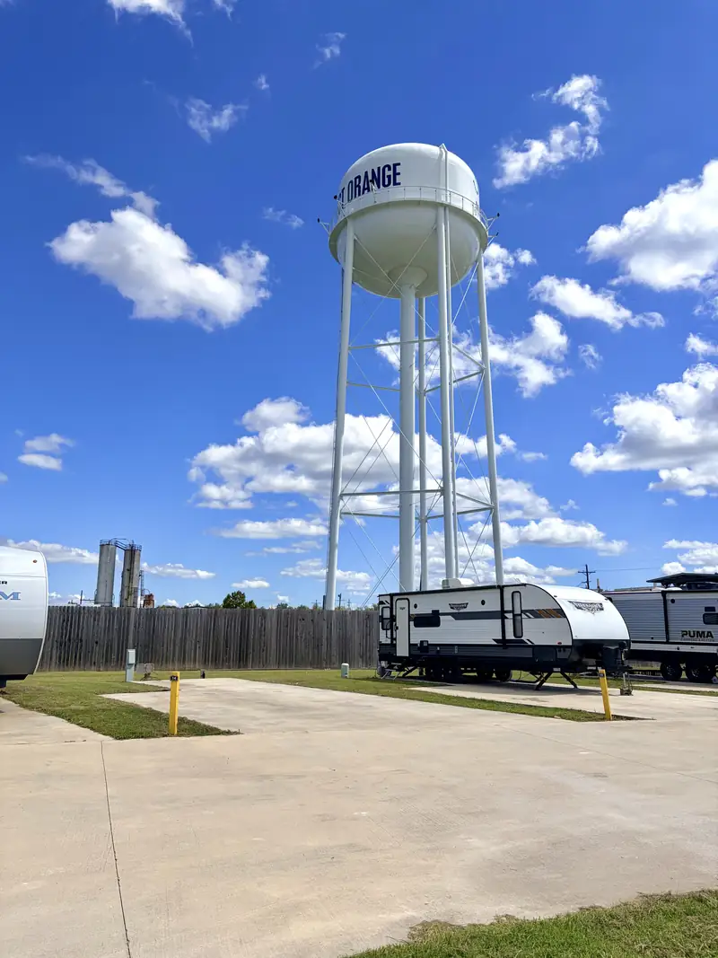 West Orange water tower above RV sites at Water Tower RV Park